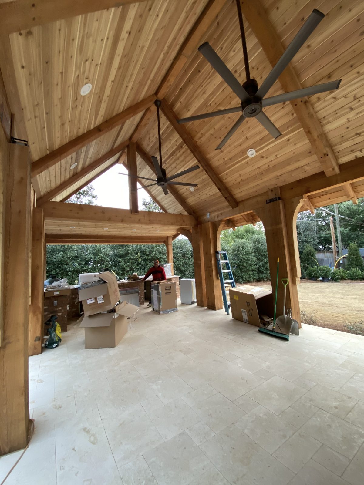 Cedar pavilion with vaulted tongue-and-groove ceiling and outdoor kitchen